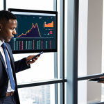 **Prompt 1: Aspiration & Strategic Vision**
    "A confident, insightful business valuation specialist (diverse ethnicity, 30s-40s, sharp business attire) stands in a modern, sunlit corporate office. Behind them, large, dynamic digital displays show upward-trending financial graphs, complex market data, and a blurred cityscape, symbolizing growth and global reach. They hold a tablet or a pen, looking thoughtfully into the distance with a subtle glow around them, representing strategic thinking and understanding of future potential. The scene conveys professionalism, aspiration, and the blend of finance and forward-looking vision. High-resolution, professional photography style."
